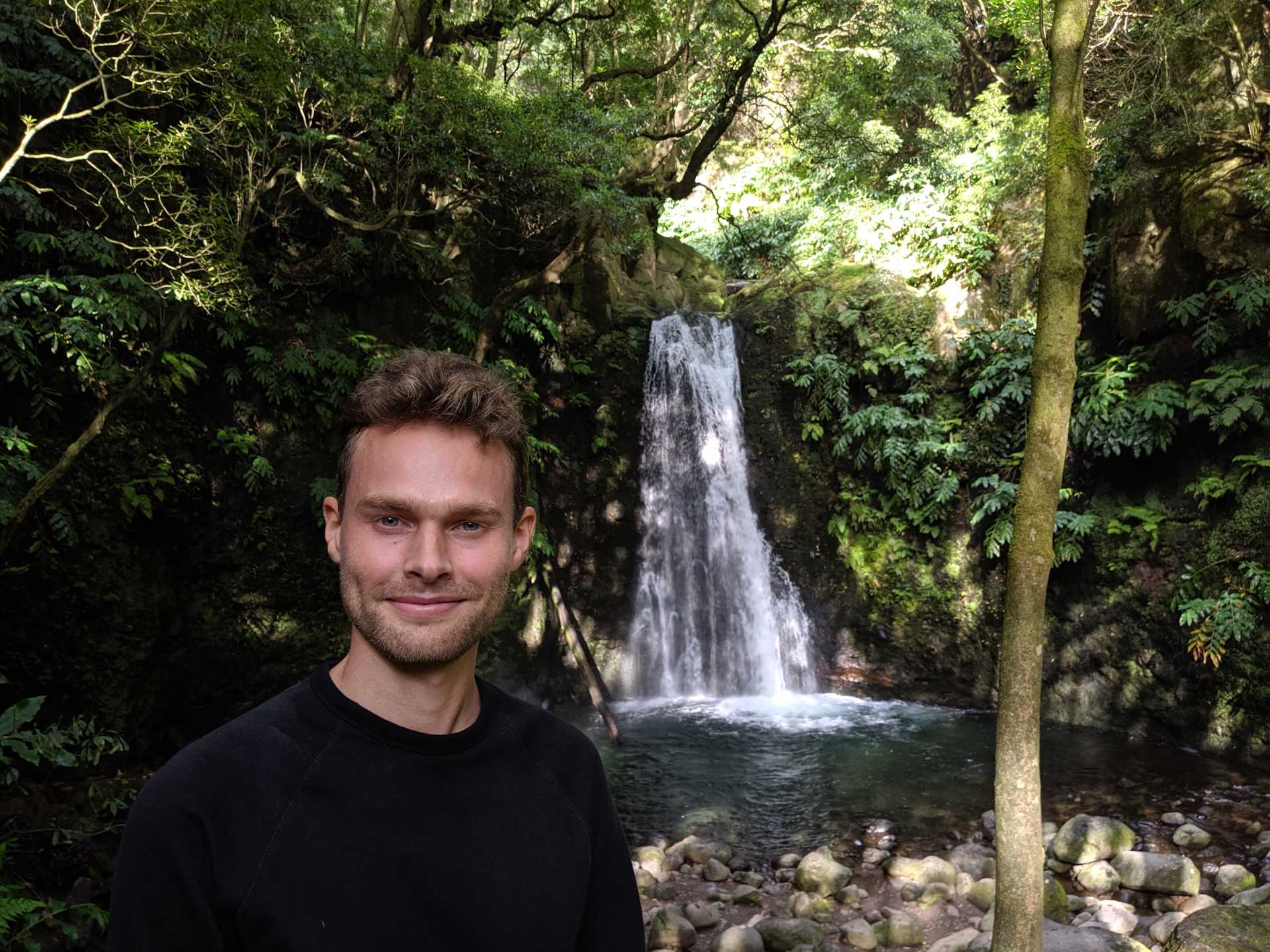 luuk van langen in front of a waterfall